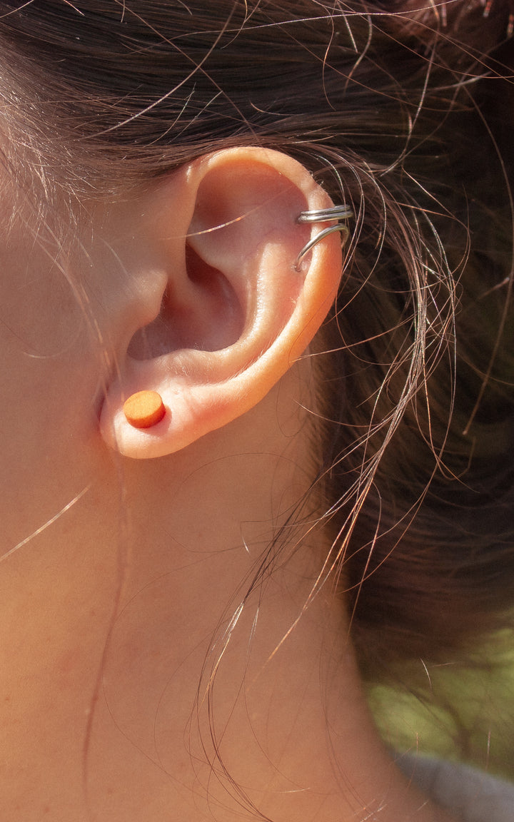 Drummer round stud earrings