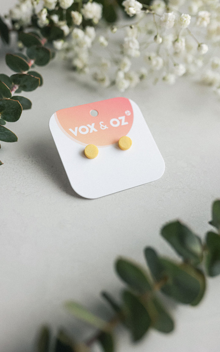 Drummer round stud earrings
